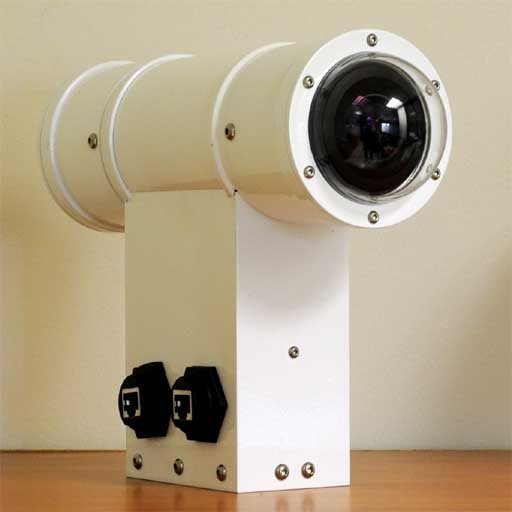 The TCam: two optics folded into one compact body.